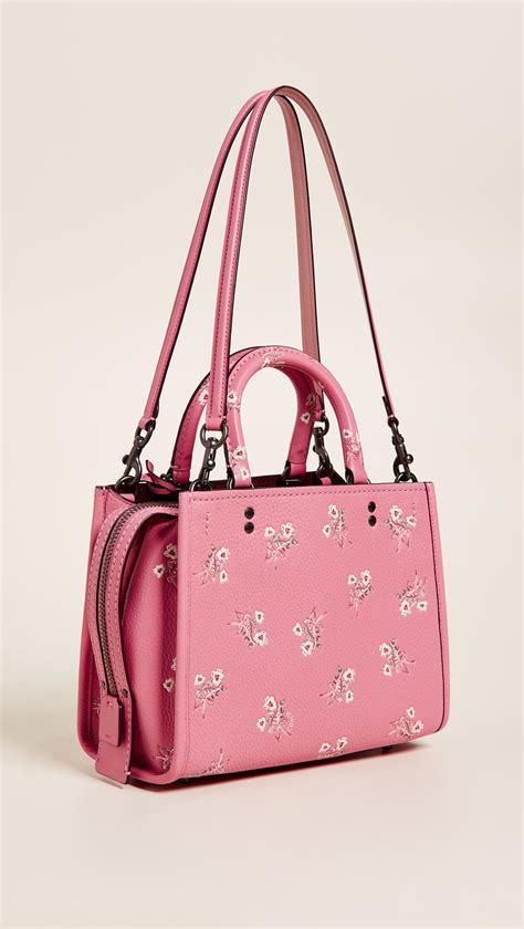 coach purse with pink bows